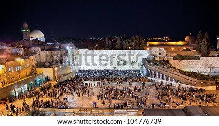 Western Wall  on the Temple Mount (Har Ha-Bayit) and the golden Dome of the Rock at night  in Jerusalem, Israel