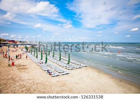 MAMAIA,ROMANIA-AUGUST 11:Beautiful beach in summer on August 11, 2012 in Mamaia, Romania. Mamaia is one of most popular summer destination in Romania for hundred of thousands of tourists a year.