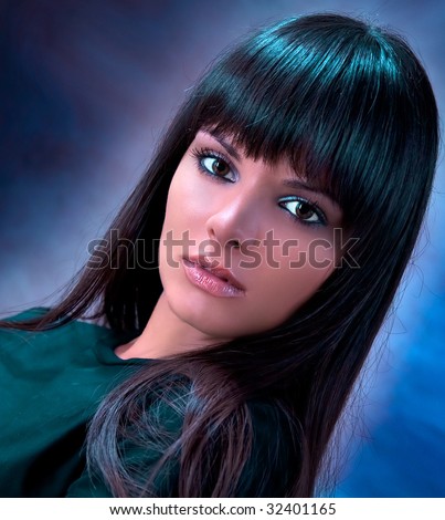 Studio portrait of Indian beauty, brunette with black hair