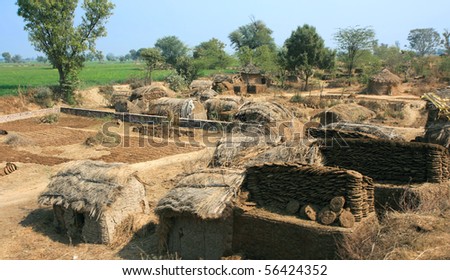 Huts in poor village, near Agra,   India