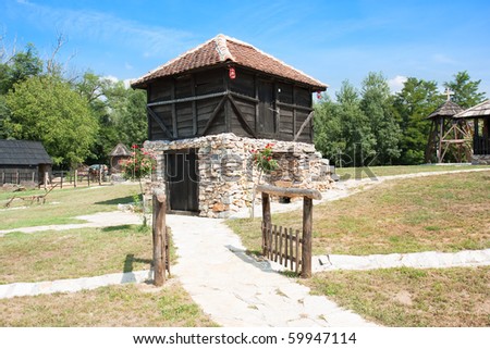 Traditional Timber ethno houses with stone base.Velika Plana. Eastern Europe - Serbia