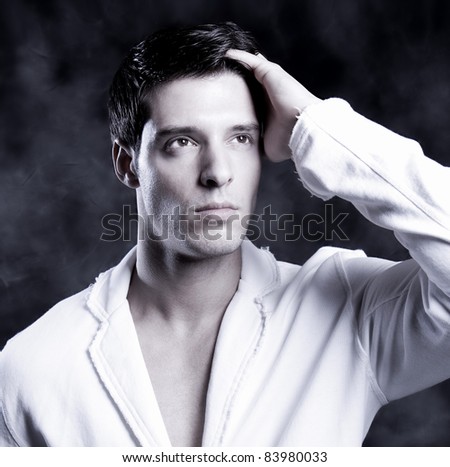 Fashion Shot of a Young Man. A trendy European man dressed in contemporary cloth.