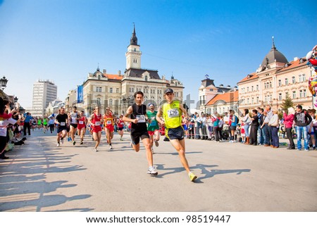 NOVI SAD, SERBIA - MAR, 25: Unidentified runners on the street during the Novi Sad spring Marathon on March 25, 2012 in Novi Sad, Srbia