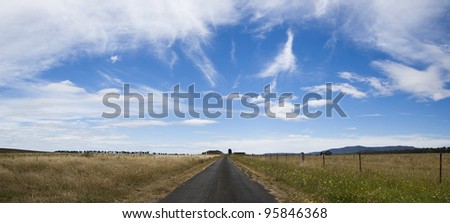 A road leads out to a country property outside Lithgow NSW Australia
