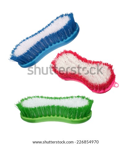 colorful Scrubbing Brushes for the everyday cleaning on a white background