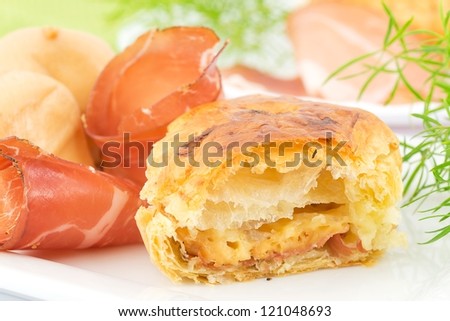 puff pastry stuffed with bacon and smoked cheese