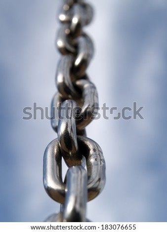 Chain links on sky background