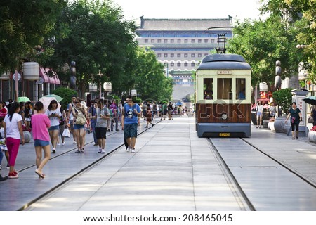 BEIJING, CHINA :July 15: Dashilan Commercial Street, Tourists and shoppers line Qianmen Street on July 15, 2014 in Beijing, China.