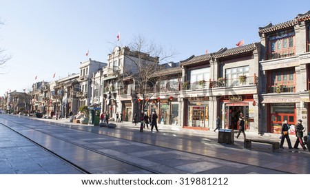 BEIJING, CHINA --February 10: Dashilan Commercial Street, Tourists and shoppers line Qianmen Street on February 10, 2015  in Beijing, China.