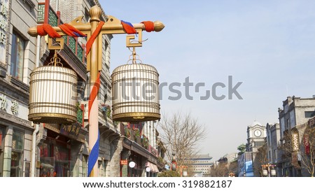 BEIJING, CHINA --February 10: Dashilan commercial street, the shape of the lamp cage,tourists and shoppers line Qianmen Street on February 10, 2015  in Beijing, China.