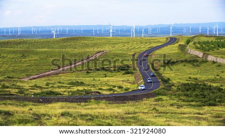 China - Inner Mongolia - August 17: Prairie Wind Power and highways. August 17,2014. Inner Mongolia, China.