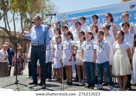 TEL AVIV - May 08: The children chorus of Kiryat Shmona prepares to sing after Mayor of Tel Aviv addressed people on Memorial Day for Victory over Nazism on May 8, 2015