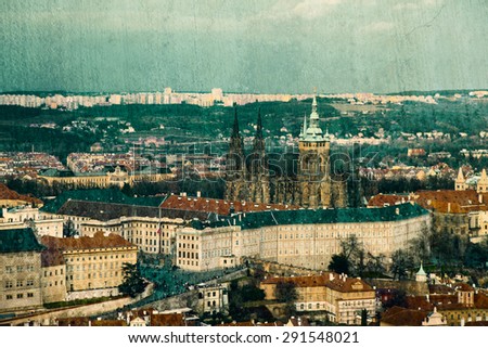 Vintage textured postcard with Prague Castle and St. Vitus Cathedral (texture added, teal tinted)