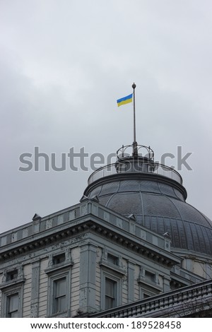 MONTREAL, QC, CANADA APRIL 27 2014. Ukrainian flag flying on top of city building in support for the Ukrainian people.