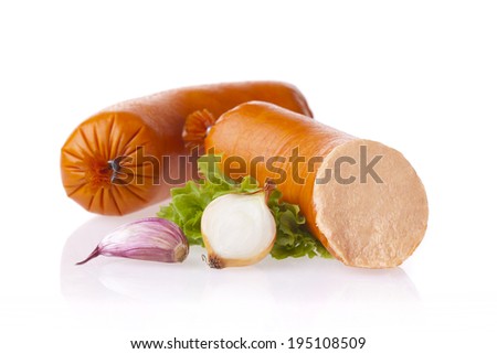 Fresh polish meat spread sausages. Pate composition taken on white background with reflection.
