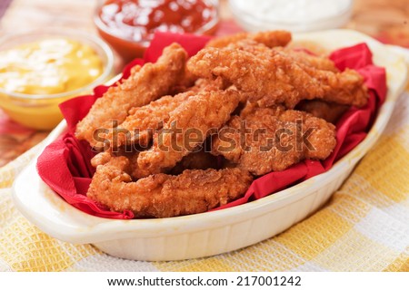 Southern fried chicken nuggets served with dipping sauces