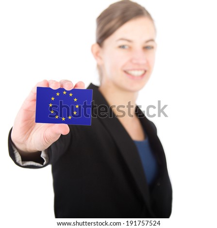 business woman holding a card with the flag the European Union. With focus on the card