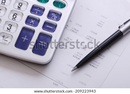 Calculator bill and pen, business and financial issue