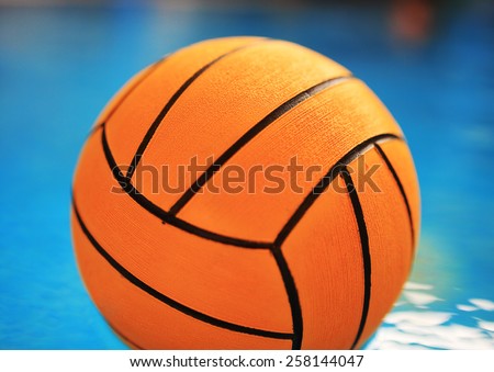 Orange color water.ball in swimming-pool