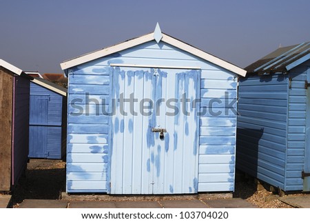 Beach hut in process of being repainted at Ferring near Worthing. West Sussex. England.