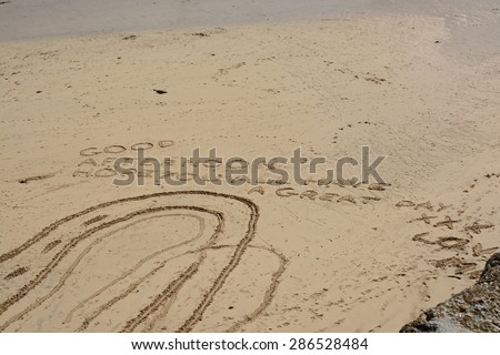 Good Afternoon Message written in the sand on beach at Saint Ives, Cornwall, England