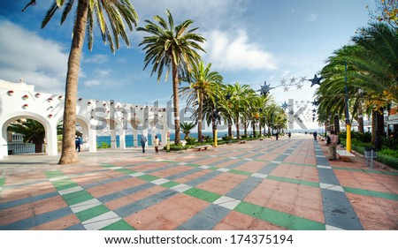 NERJA, SPAIN-DECEMBER 14, 2013: View of Balcon de Europa, spanish landmark in Nerja, Costa del Sol.  Its completely pedestrianised and it is lined with cafes and restaurants on december 14, 2013
