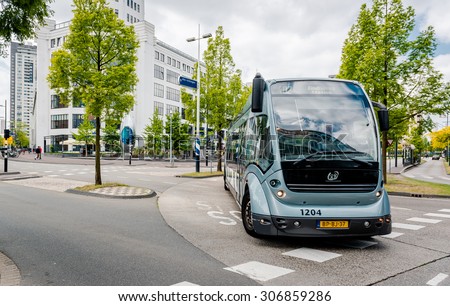 Eindhoven, Netherlands - May 24, 2015: Bus rapid transit (Phileas) on the Eindhoven road. The biggest feature of the bus is the recharging of the battery by means of electromagnetic induction