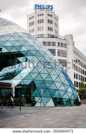 Eindhoven, Netherlands - May 24, 2015: Day view of the old Philips factory building and modern futuristic architecture in the city centre of Eindhoven. Western Europe