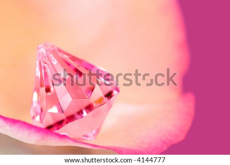 Composition of a rose leaf with pink crystal