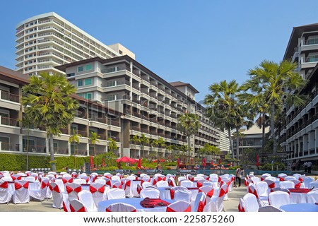 Pattaya, Thailand - on December 31, 2013: Thai employees of hotel prepare tables for traditional celebration of New year