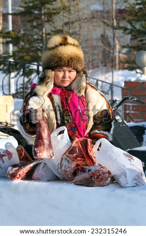 Nadym, Russia - on March 05, 2011: The woman the Nenets woman in national clothes on a traditional holiday \