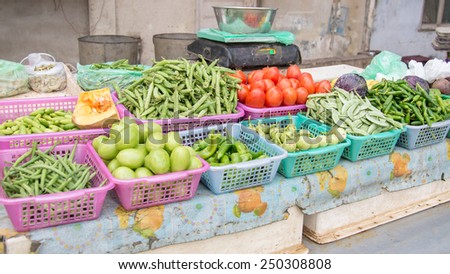 Vegetable seller selling fresh local produce