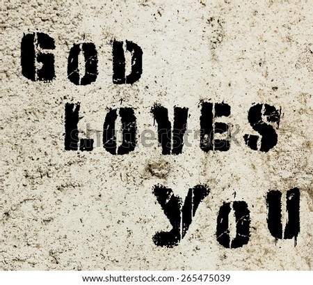 God Loves You  graffiti painted on a concrete wall