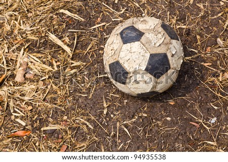 A left old football on the ground
