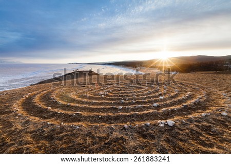 Labyrinth on the hill near Baikal lake at the sunrise. Russia