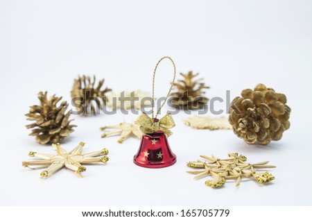 Christmas-tree ornaments with a little red hand-bell.
