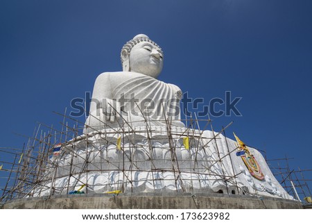Big white marble Buddha statue on top of the hill - Phuket, Thai