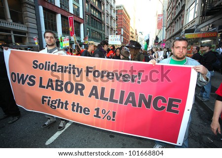 NEW YORK CITY - MAY 1 : Occupy Wall Street is joined by labor unions expressing their solidarity by marching down Broadway in honor of International Workers\' Day  on May 1 2012 in New York City