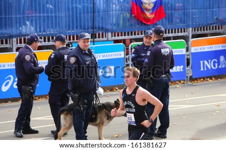NEW YORK CITY - NOVEMBER 3 2013: the 42nd IMG New York City Marathon commenced after a one year hiatus due to Hurricane Sandy. K9 units stationed by finish line. November 3 2013 in New York City.