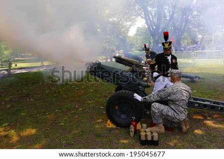 NEW YORK CITY - MAY 26 2014: The 146th annual King's County Memorial Day Parade, one of the nation's oldest, honored fallen & living veterans in the streets of Bay Ridge, Brooklyn. Howitzer salute