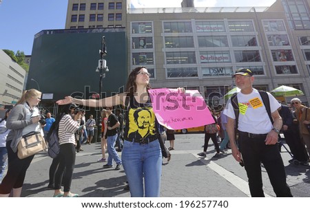 NEW YORK CITY - MAY 31 2014:Stop Patriarchy, a feminist group aligned with the Revolutionary Communist Party, protested the shootings by Elliot Roger in Santa Barbara with a rally at Union Square Park