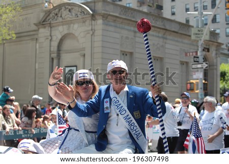 NEW YORK CITY - JUNE 12014: The 50th annual Israel Day Parade drew thousands to the Upper East Side of Manhattan to honor the state\'s 66th anniversary. Grand Marshal Robert Benrimon rides in car