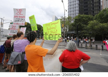 NEW YORK CITY - JULY 19 2014: Immigration opponents faced off against immigrant supporters to protest amnesty for undocumented immigrants in front of the United Nations.
