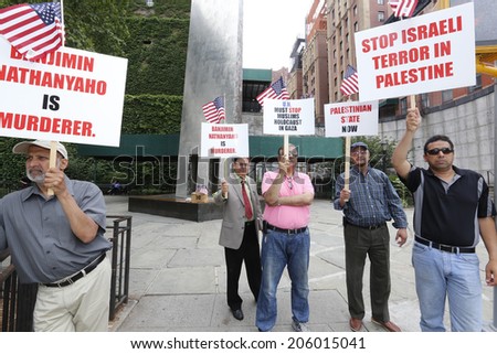 NEW YORK CITY - JULY 19 2014: More than a dozen Muslim-American men protested Israeli Prime Minister Benjamen Netanyahu & Israeli actions in Gaza in front of the United Nations building on First Ave