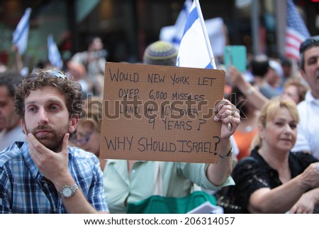 NEW YORK CITY - JULY 20 2014: several thousand supporters of Israeli actions in Gaza staged a rally in Times Square. Hand-lettered sign on cardboard denouncing Hamas