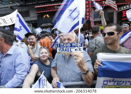NEW YORK CITY - JULY 20 2014: several thousand supporters of Israeli actions in Gaza staged a rally in Times Square. Displaying flags & bumper stickers