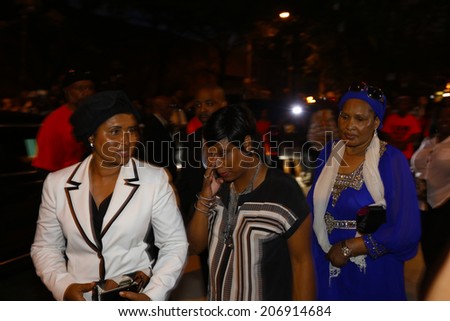 NEW YORK CITY - JULY 23 2014: Funeral services for Eric Garner, the Staten Island resident who died while being taken into custody by NYPD.  From lt: Kadiatou Diallo, Constance Malcolm & Hawa Bah