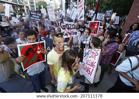 NEW YORK CITY - JULY 25 2014: ADULAH NY, a organization dedicated to divestiture from Israel, staged a protest & march in Lower Manhattan against Israeli actions in Gaza.