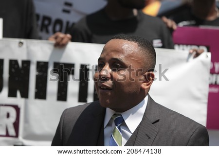 NEW YORK CITY - JULY 31 2014: VOCAL NY, the Justice Committee & other activist coalitions rallied with NY City Council members in front of City Hall demanding reform from the NYPD. Rashad Robinson