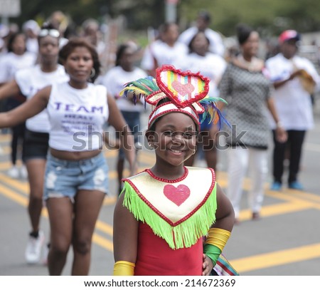 NEW YORK CITY - AUGUST 1 2014: the 47th annual West Indian Day Carnival parade on Labor Day filled Eastern Parkway with more than one million spectators celebrating Caribbean culture & heritage.